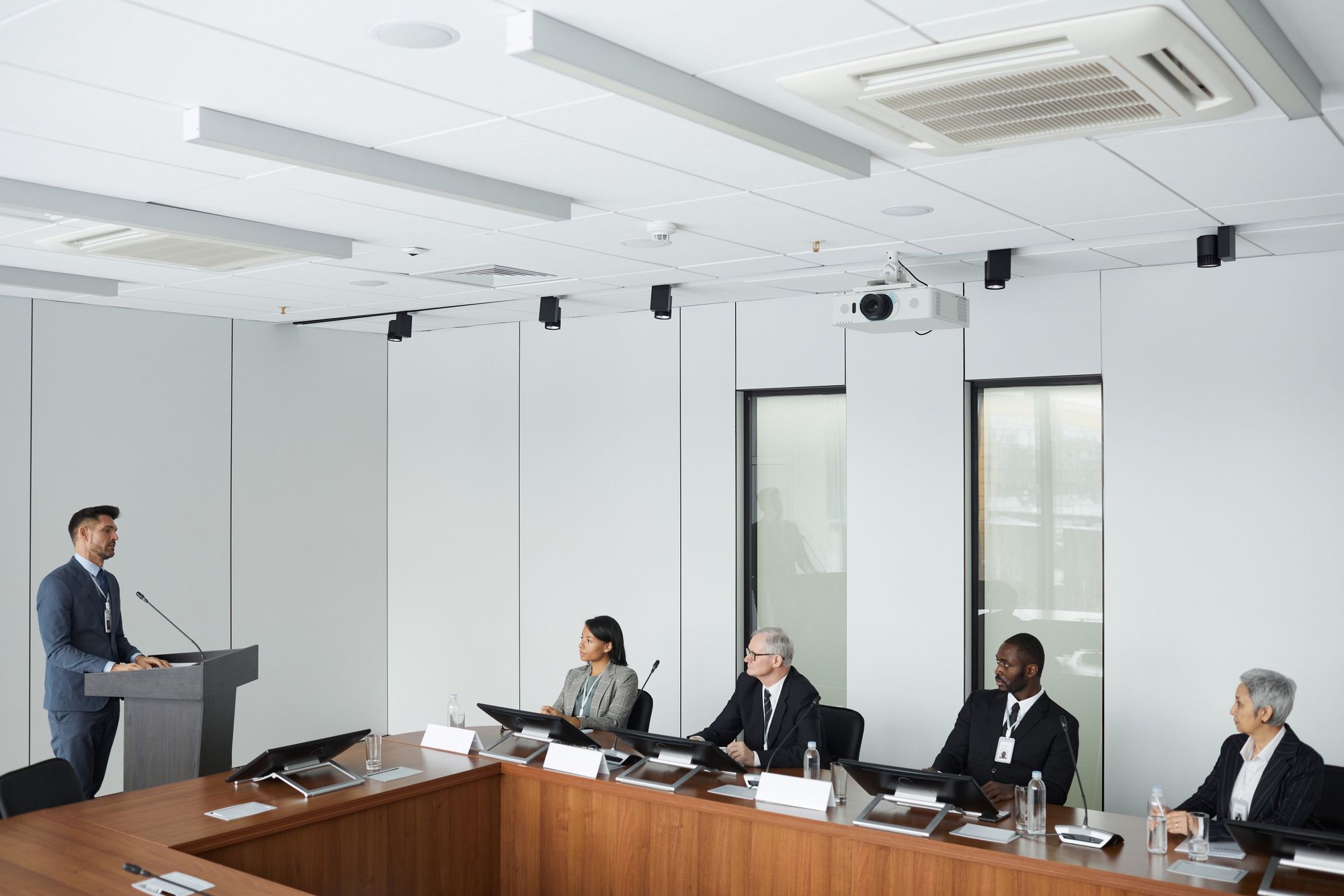 Expert and counsel reviewing case findings together across a conference table